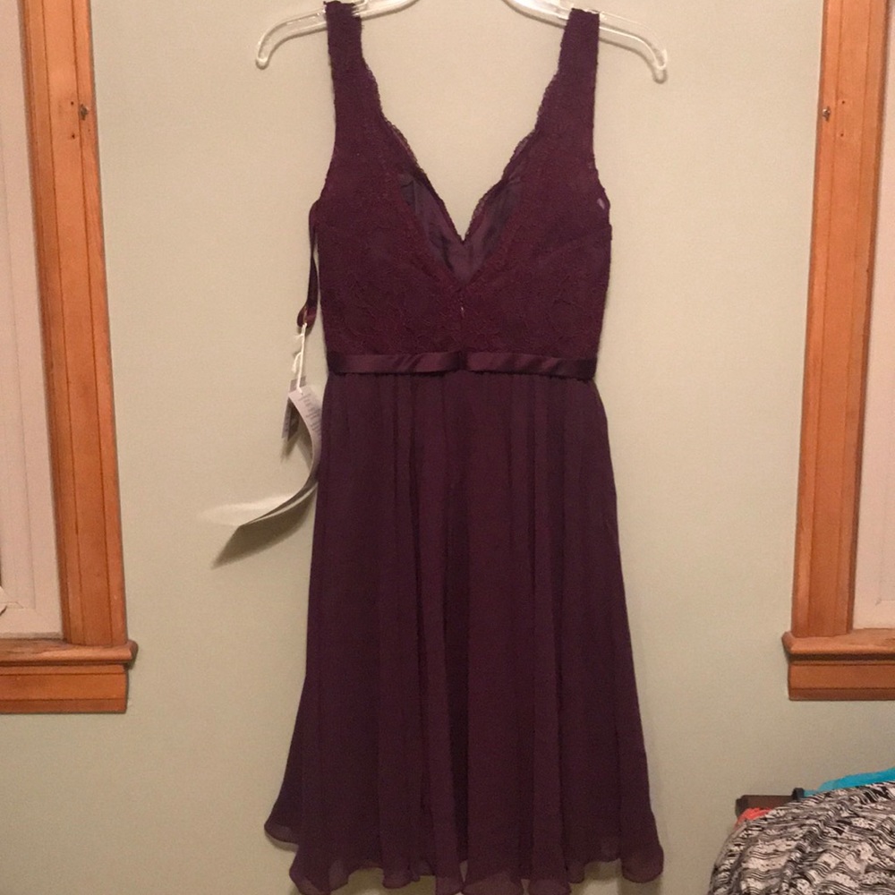Never worn, stunning eggplant dress. Size 4. - Picture 2 of 3